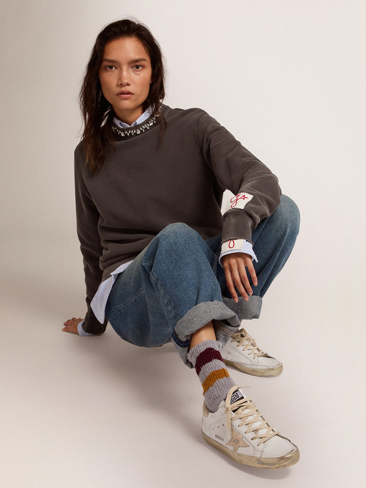 Women's Super-Star with gold sparkle foxing and metal stud lettering sneakers