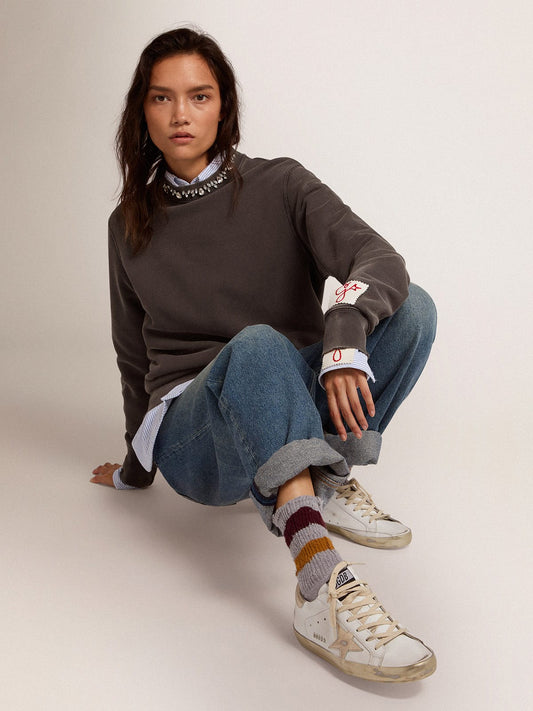 Women's Super-Star with gold sparkle foxing and metal stud lettering sneakers
