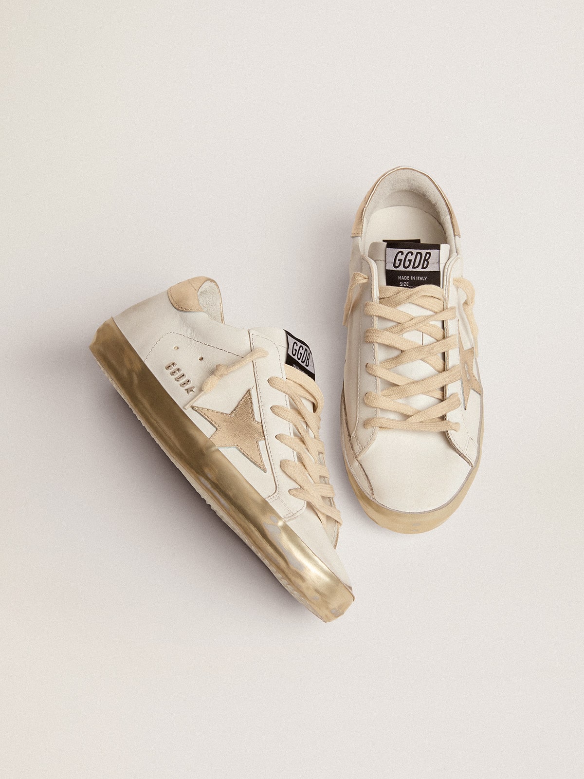 Women's Super-Star with gold sparkle foxing and metal stud lettering sneakers